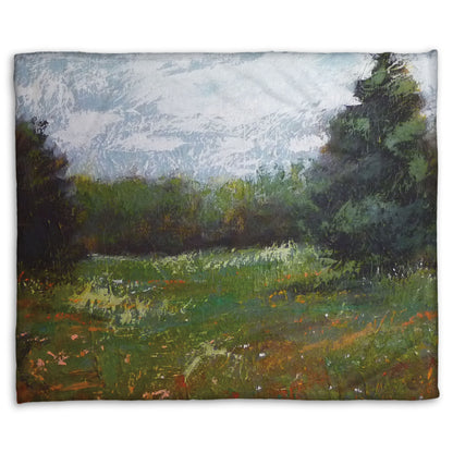 A fleece throw blanket designed with an expressive painting of a grassy field and grove of trees.
