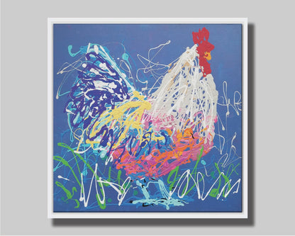 A drip painting of a white and blue rooster on a gentle blue background, splattered with accents of green, white, pink, and yellow. Printed on canvas in a float frame.