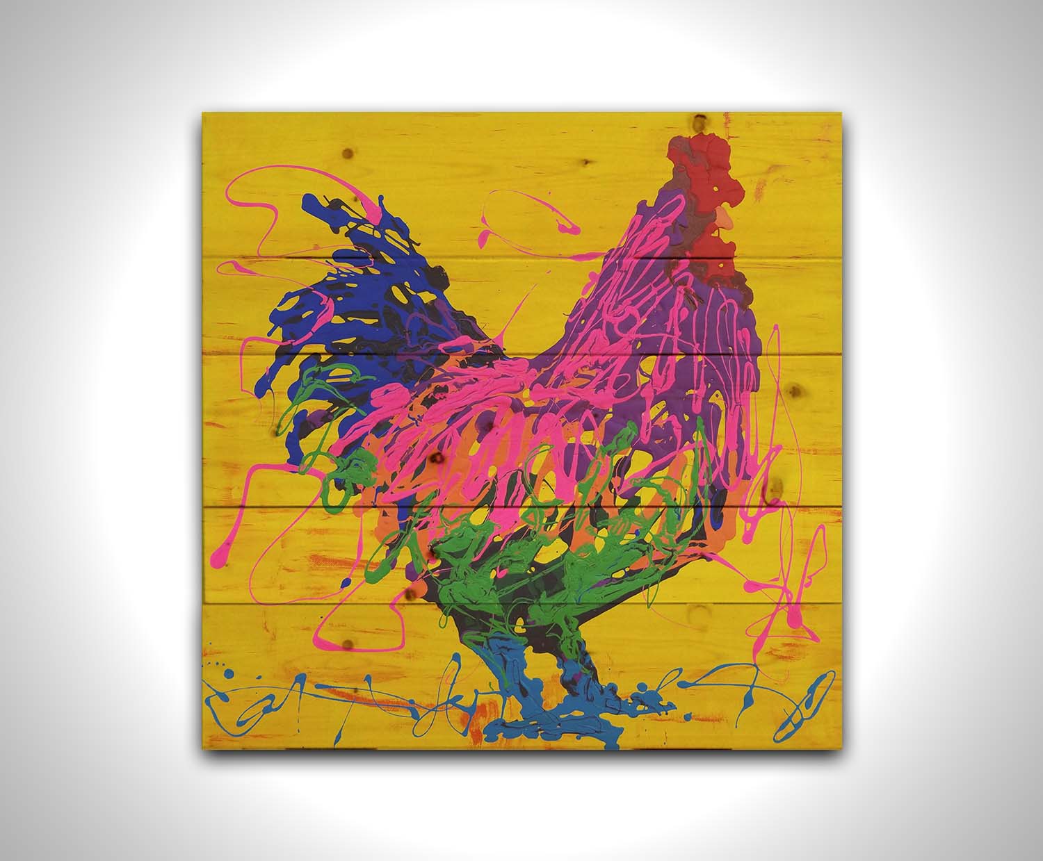 A drip painting of a pink and purple rooster on a bright yellow background, accented with blue and green. Printed on a wood pallet.