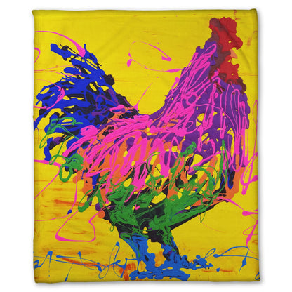 A fleece blanket designed with a drip painting of a pink and purple rooster on a bright yellow background, accented with blue and green.