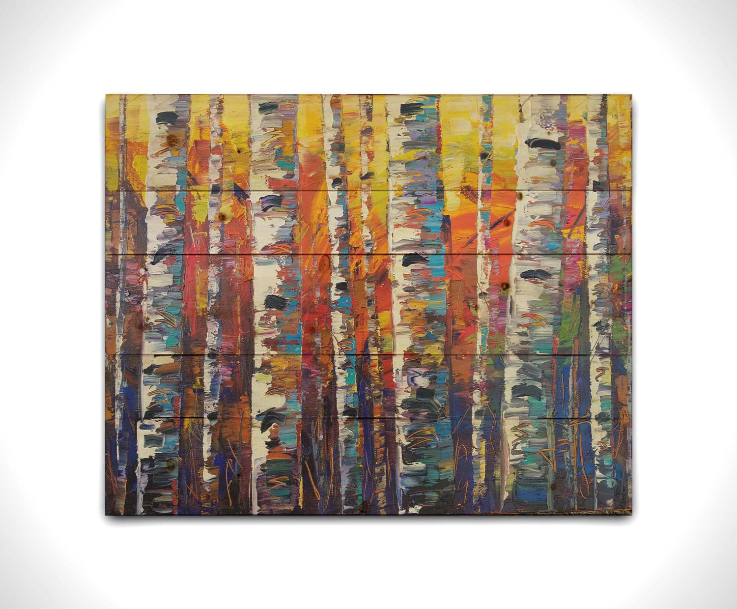 A colorful painting of a forest of birch trees in arbitrary color, with white trunks against a yellow, red, and blue background made of large swaths of pallet knife paint. Printed on a wood pallet.