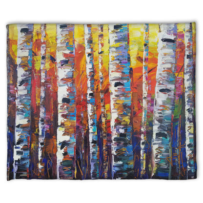A fleece throw blanket designed with a colorful painting of a forest of birch trees in arbitrary color, with white trunks against a yellow, red, and blue background made of large swaths of pallet knife paint.