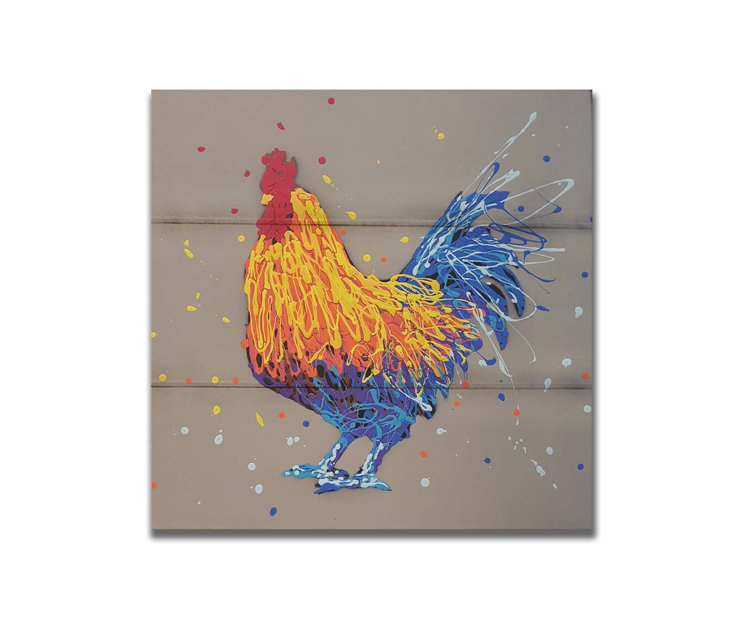 A drip painting portrait of a rooster in red, orange, yellow, blue, and purple against a gray background. Printed on a box board.