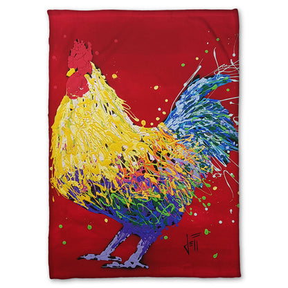 A fleece throw blanket designed with a drip painting of a multicolored rooster on a red background, accented with dots and splatters of yellow and green. 