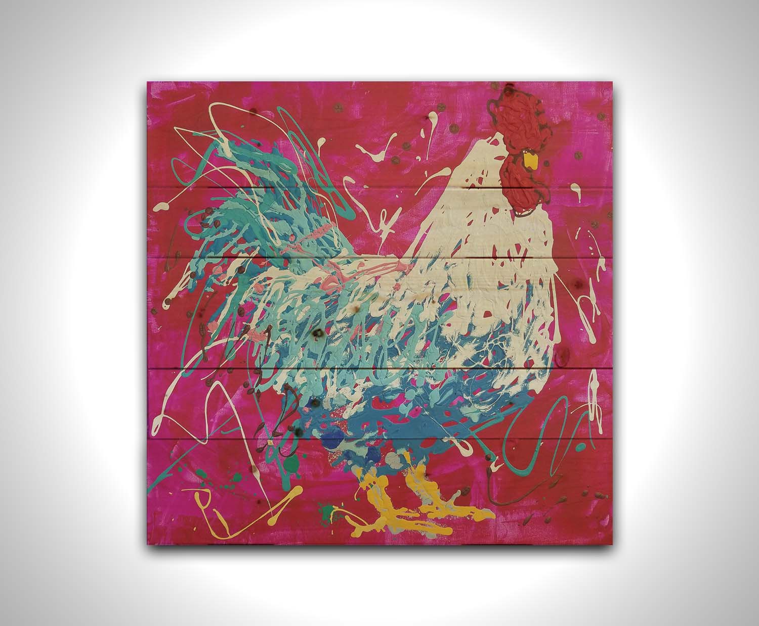 A drip painting of a white and blue rooster on a red and pink background, accented by white, yellow, green, and brown. Printed on a wood pallet.