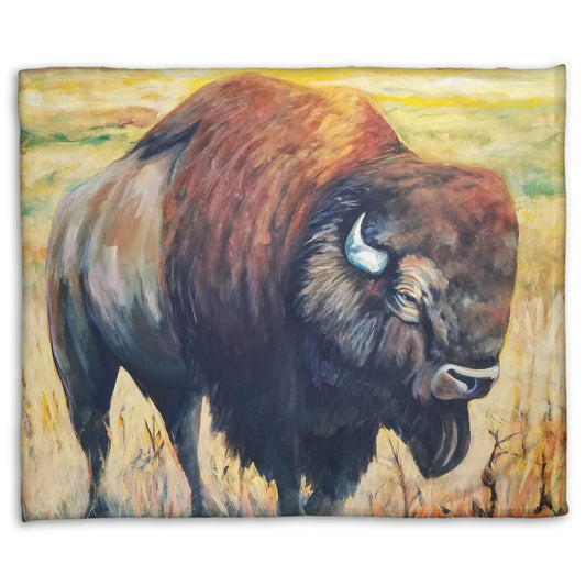 A fleece throw blanket designed with a painting of an American bison, standing in a light yellow field.