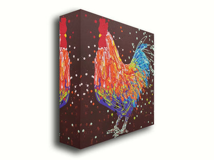 A drip painting of an orange, blue, and red rooster against a brown background. Printed on canvas.