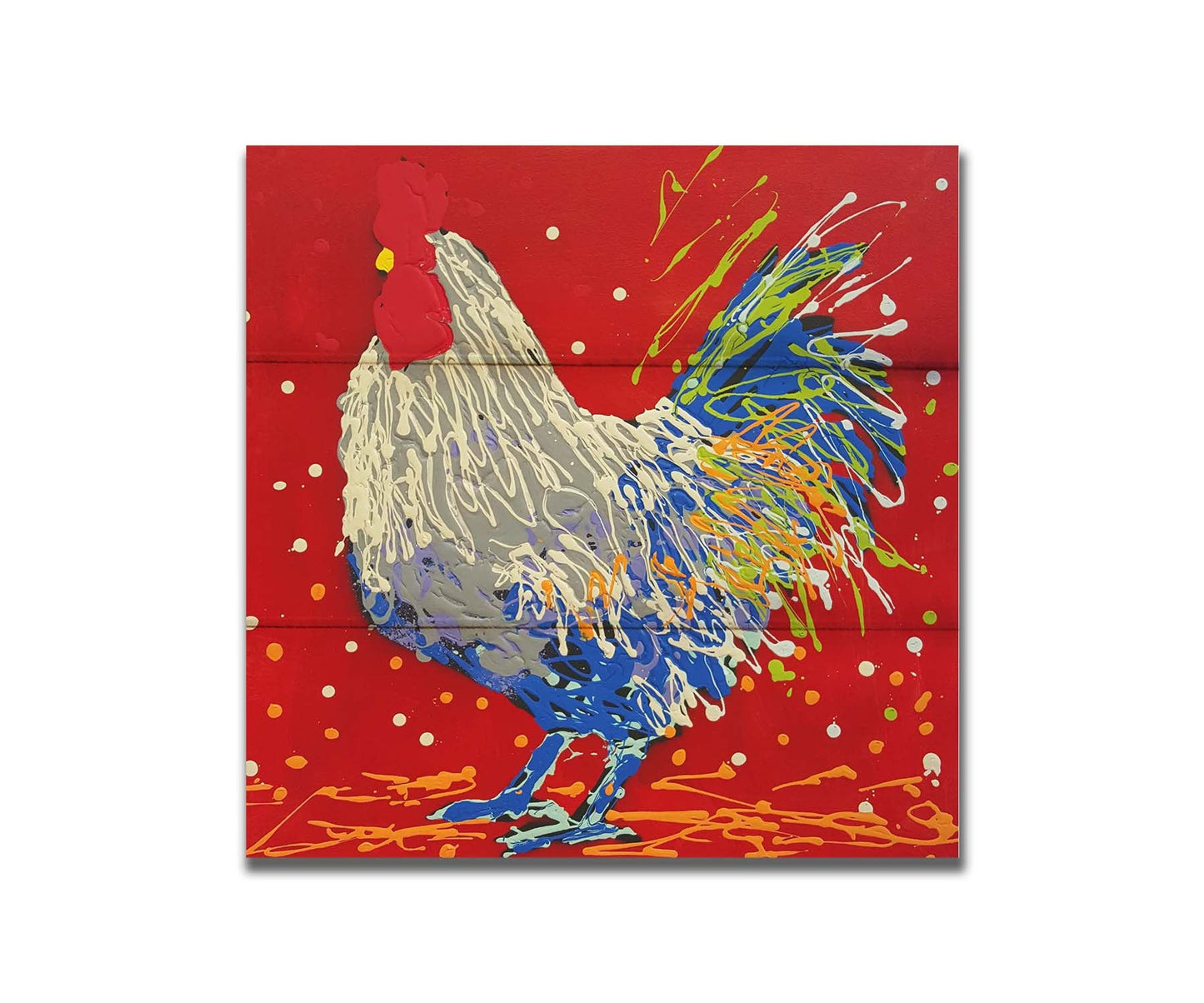 A drip painting of a white, gray, and blue rooster on a red background, accented by yellow and green. Printed on a box board.