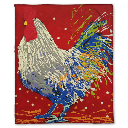 A fleece throw blanket designed with a drip painting of a white, gray, and blue rooster on a red background, accented by yellow and green.