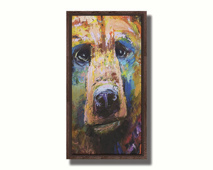 A painting of a bear's face closeup, accented with blue and yellow. Printed on canvas in a float frame.