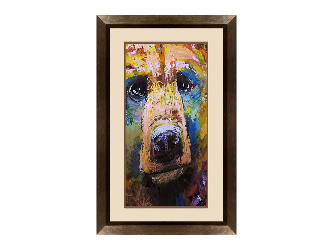 A painting of a bear's face closeup, accented with blue and yellow. Printed on paper, matted, and framed.