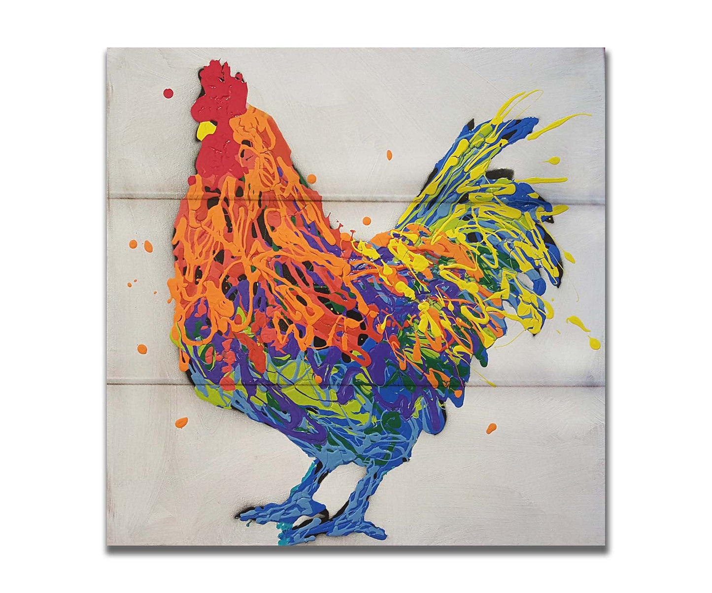 A drip painting of a multicolored rooster on a white background. Printed on a box board.