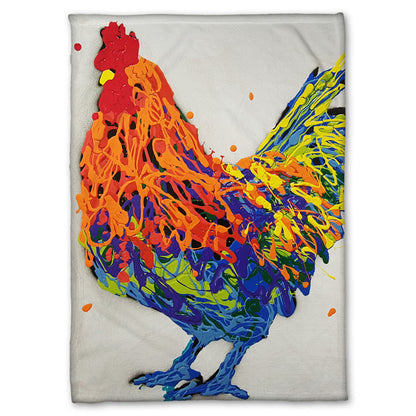 A fleece blanket designed with a drip painting of a multicolored rooster on a white background.