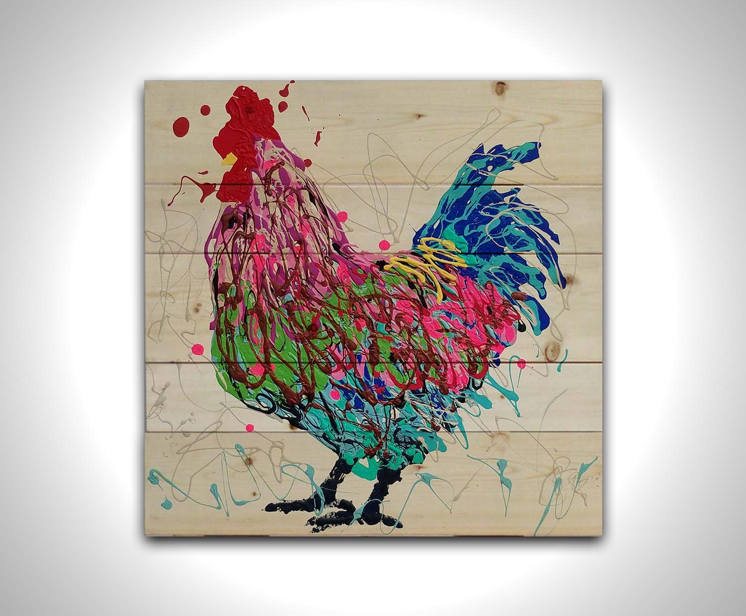 A drip painting of a pruple, pink, green, and blue rooster on a whie background. Printed on a wood pallet.