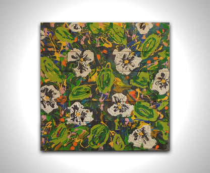 A painting of a top down drip painting view of white pansy flowers. Printed on a box board.