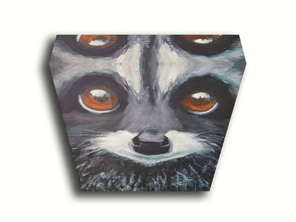 A close up painting of a raccoon's face, with big brown eyes. Printed on canvas.