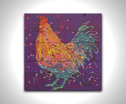 A drip painting of a blue and orange rooster on a purple background, accented with pink, red, and yellow. Printed on a wood pallet.