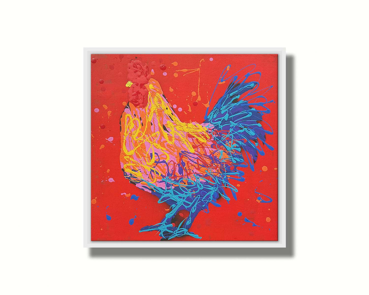 A drip painting of a blue, pink, and yellow rooster on a bright red background. Printed on canvas in a float frame.