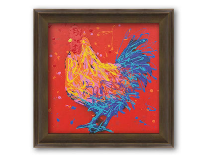 A drip painting of a blue, pink, and yellow rooster on a bright red background. Printed on canvas and framed.