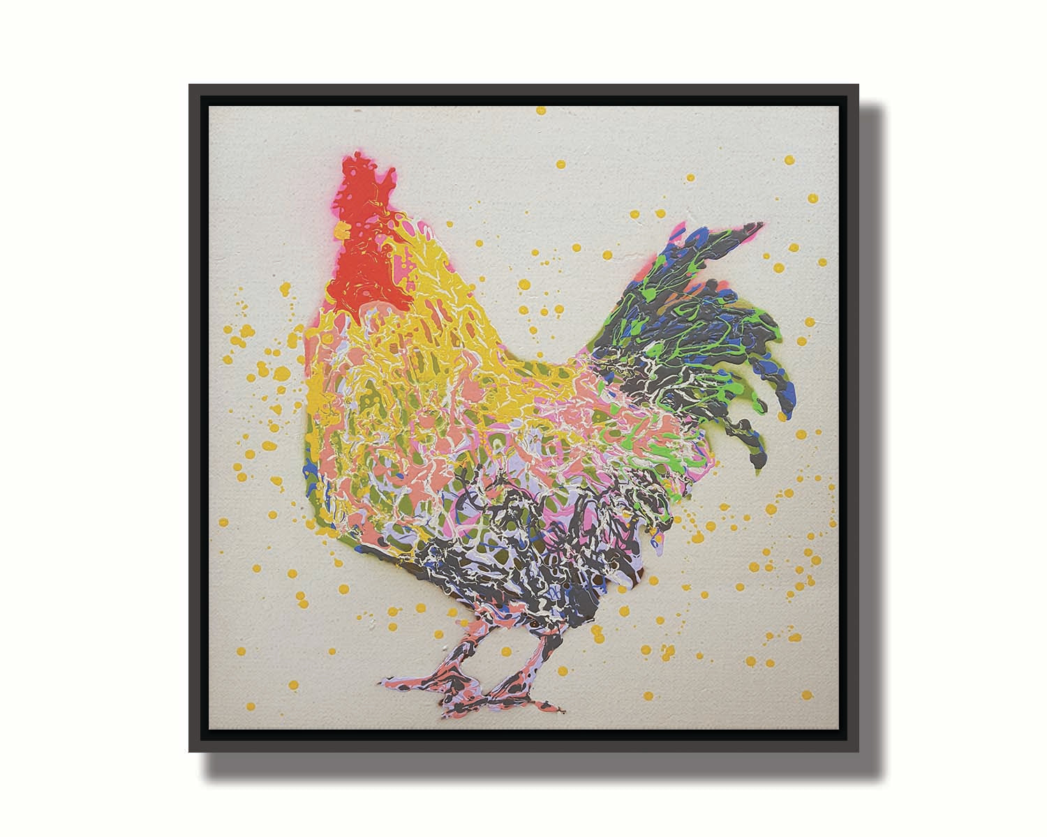 A drip painting of a gray and yellow rooster, on a white background, accented in blue, green, pink, white, and red. Printed on canvas in a float frame.