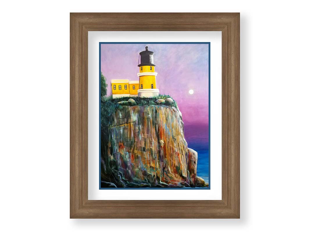 A painting of a bright yellow lighthouse perched on a cliff face above a vibrant blue sea, with a pink and purple sky. Printed on paper, matted, and framed.