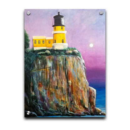 A painting of a bright yellow lighthouse perched on a cliff face above a vibrant blue sea, with a pink and purple sky. Printed on acrylic.