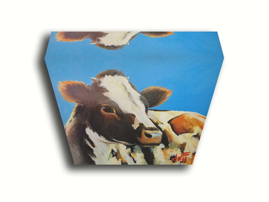 A painting of a cow basking in the sun against a bright blue background. Printed on canvas.