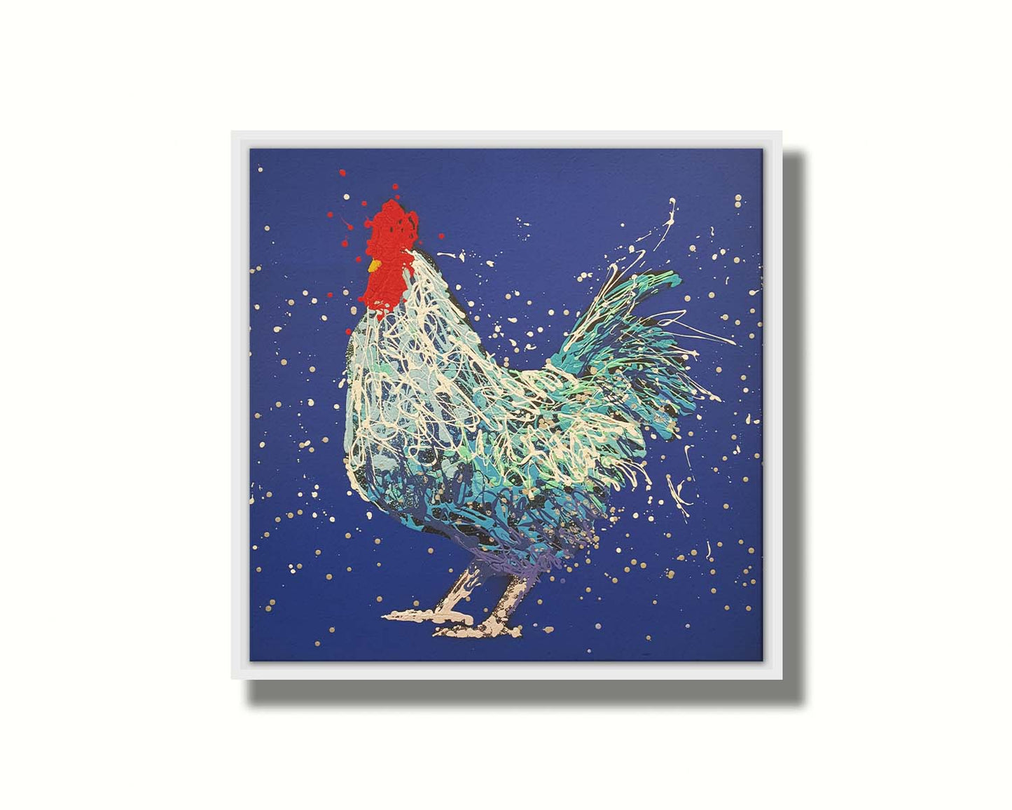 A drip painting of a white and blue rooster on a vibrant blue background. Printed on canvas in a float frame.