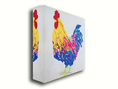 A drip painting of a yellow, blue, and pink rooster on a white background. Printed on canvas.