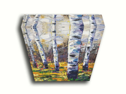 A painting of a birch forest, with vibrant grasses and foliage contrasing the black and white birch trunks. Printed on canvas.