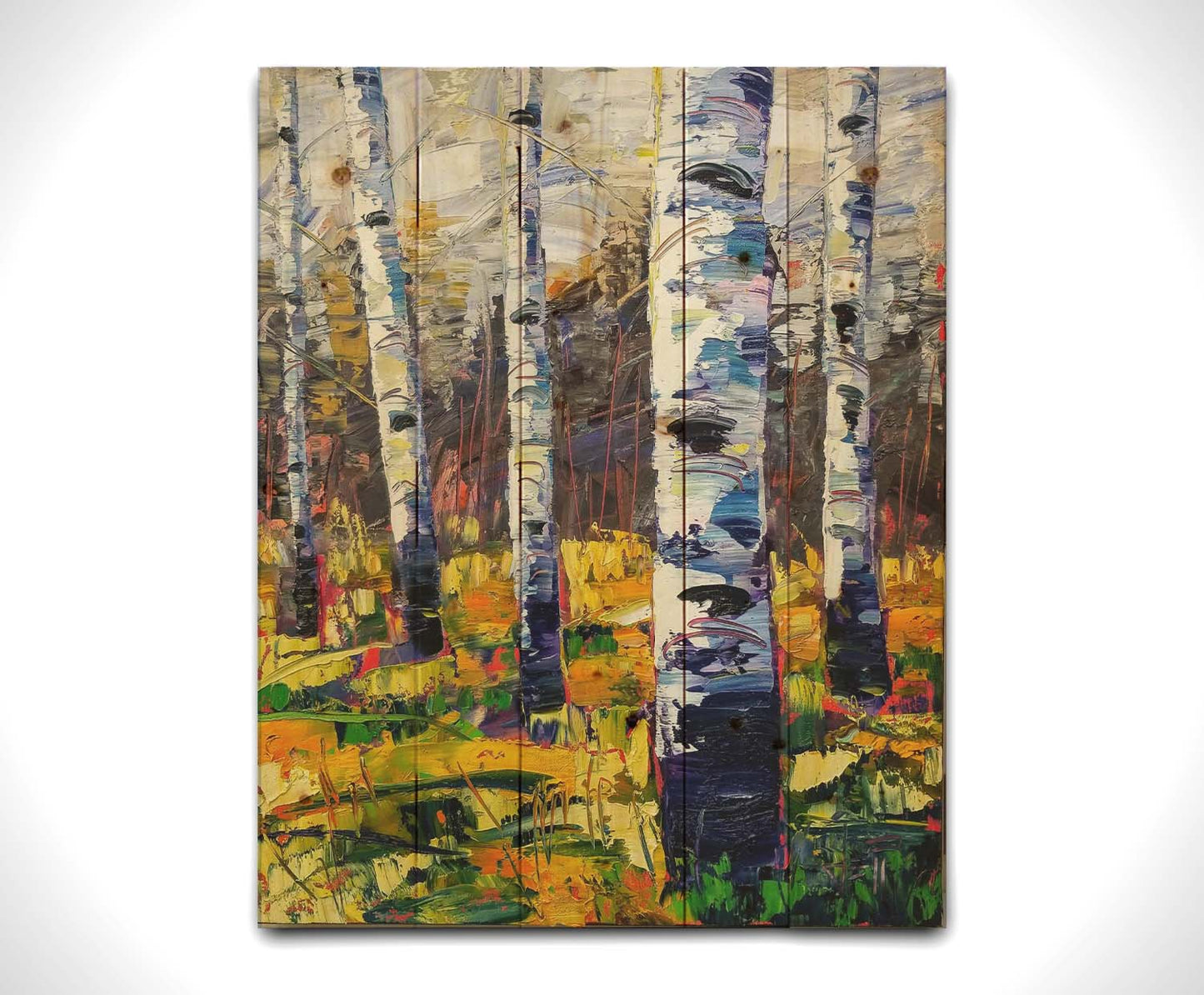 A painting of a birch forest, with vibrant grasses and foliage contrasing the black and white birch trunks. Printed on a wood pallet.