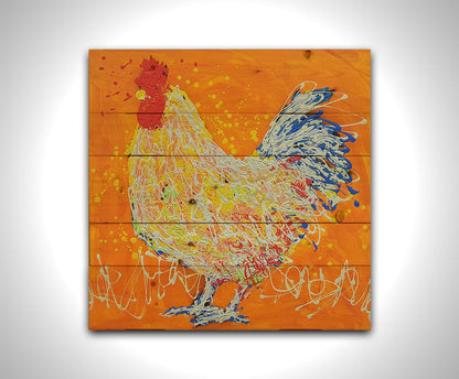 A drip painting of a white rooster on an orange background, accented with red, yellow, and blue. Printed on a wood pallet.