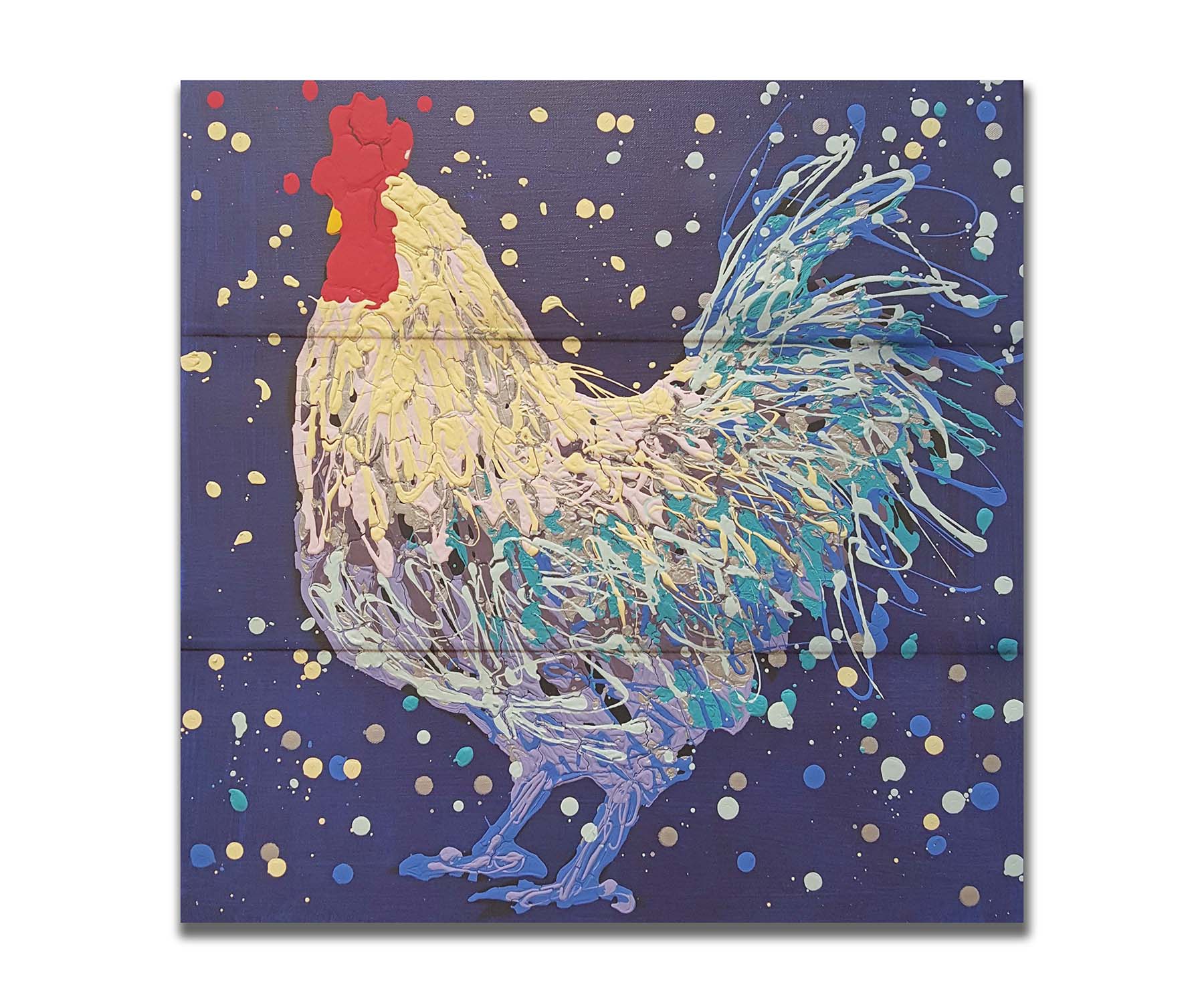 A drip painting of a white and blue rooster on a navy blue background, accented by red and gray. Printed on a box board.