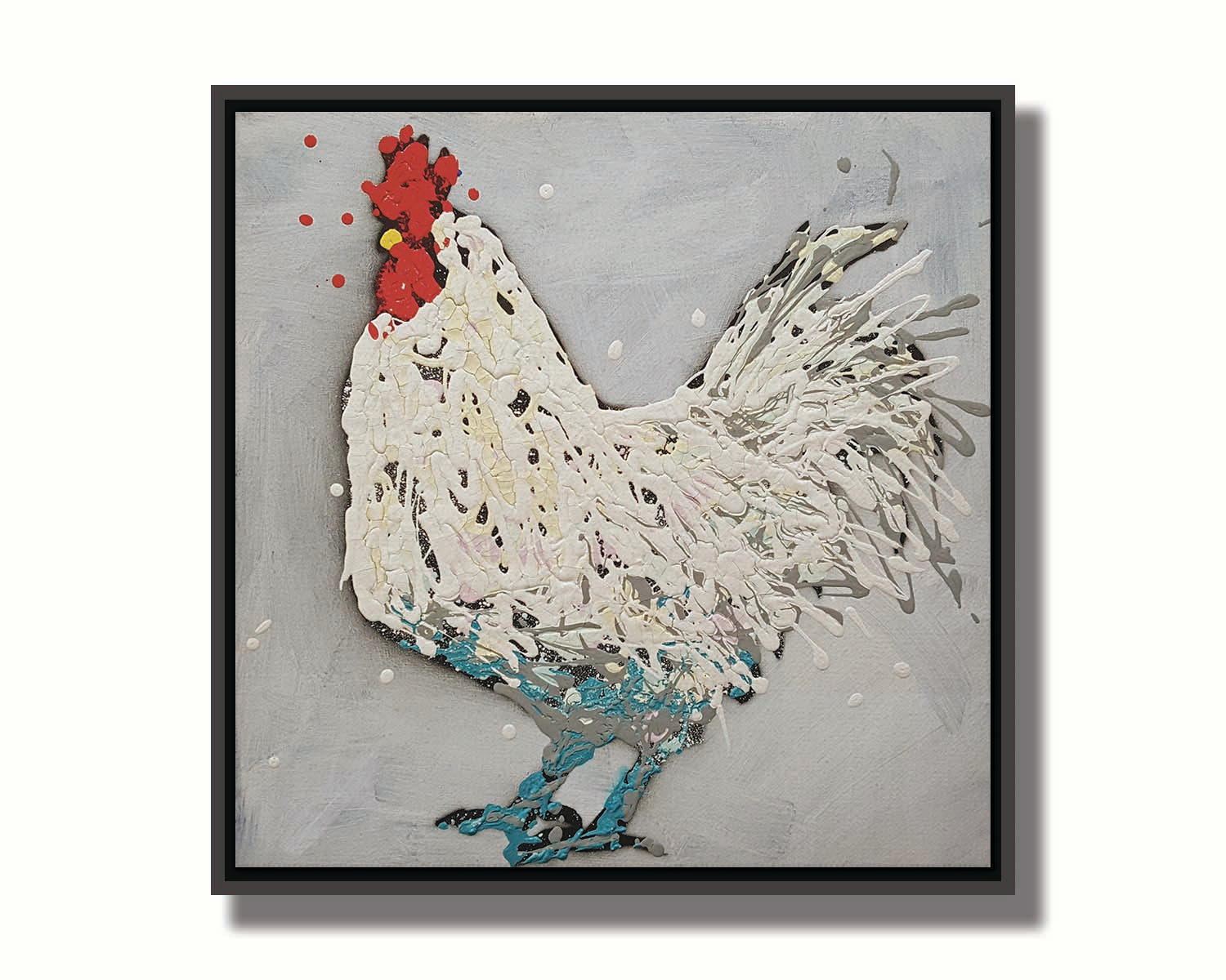 A drip painting of a white rooster on a gray background, accented with red, yellow, and blue. Printed on canvas in a float frame.