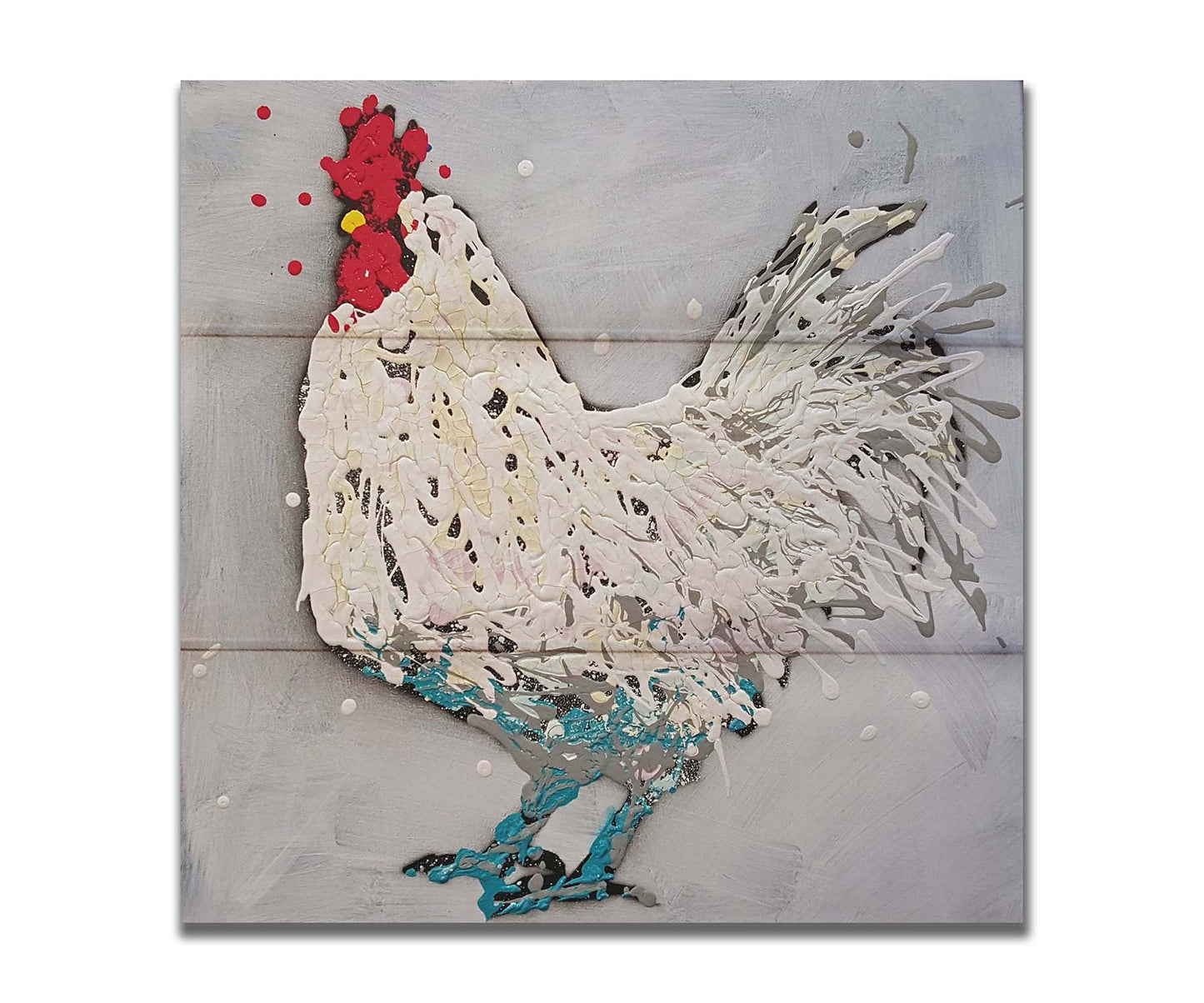 A drip painting of a white rooster on a gray background, accented with red, yellow, and blue. Printed on a box board.