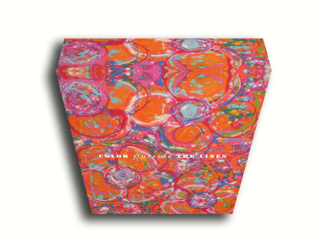 A drip painting of a cluster of abstracted flowers created with splatters of orange, red, and pink with accents of green, blue, yellow, and purple. White text in the center reads "Color outside the lines." Printed on canvas.