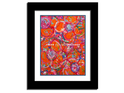 A drip painting of a cluster of abstracted flowers created with splatters of orange, red, and pink with accents of green, blue, yellow, and purple. White text in the center reads "Color outside the lines." Printed on paper, matted, and framed.