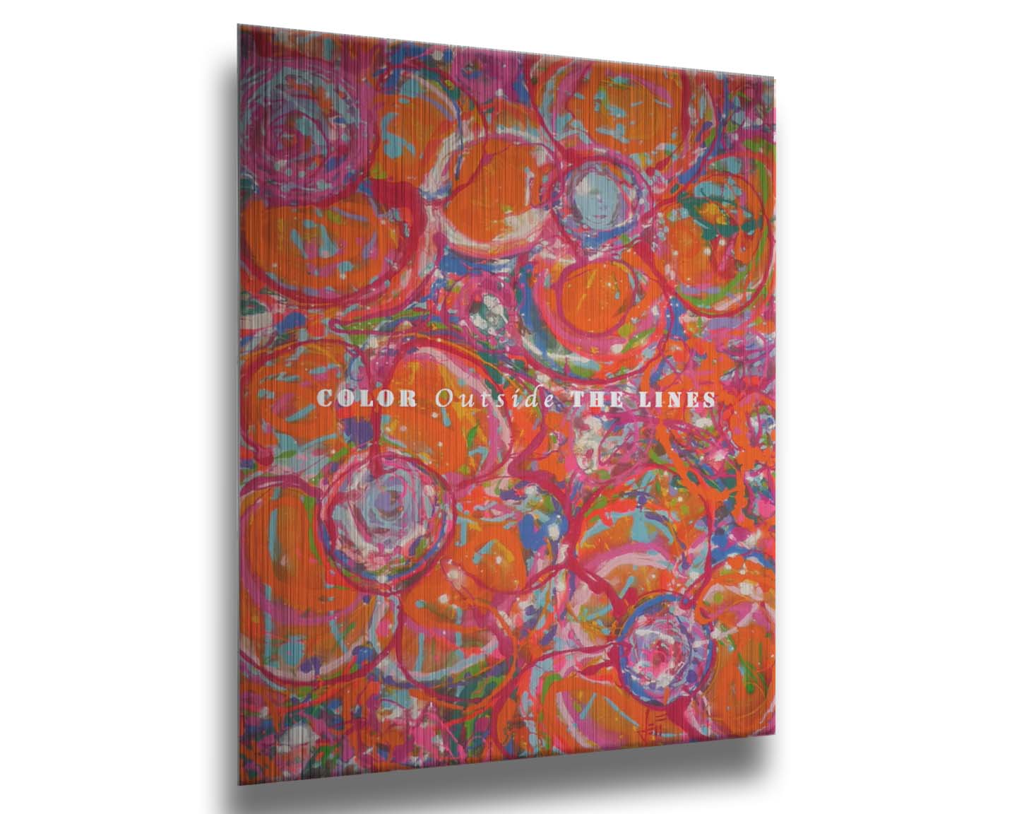 A drip painting of a cluster of abstracted flowers created with splatters of orange, red, and pink with accents of green, blue, yellow, and purple. White text in the center reads "Color outside the lines." Printed on metal.