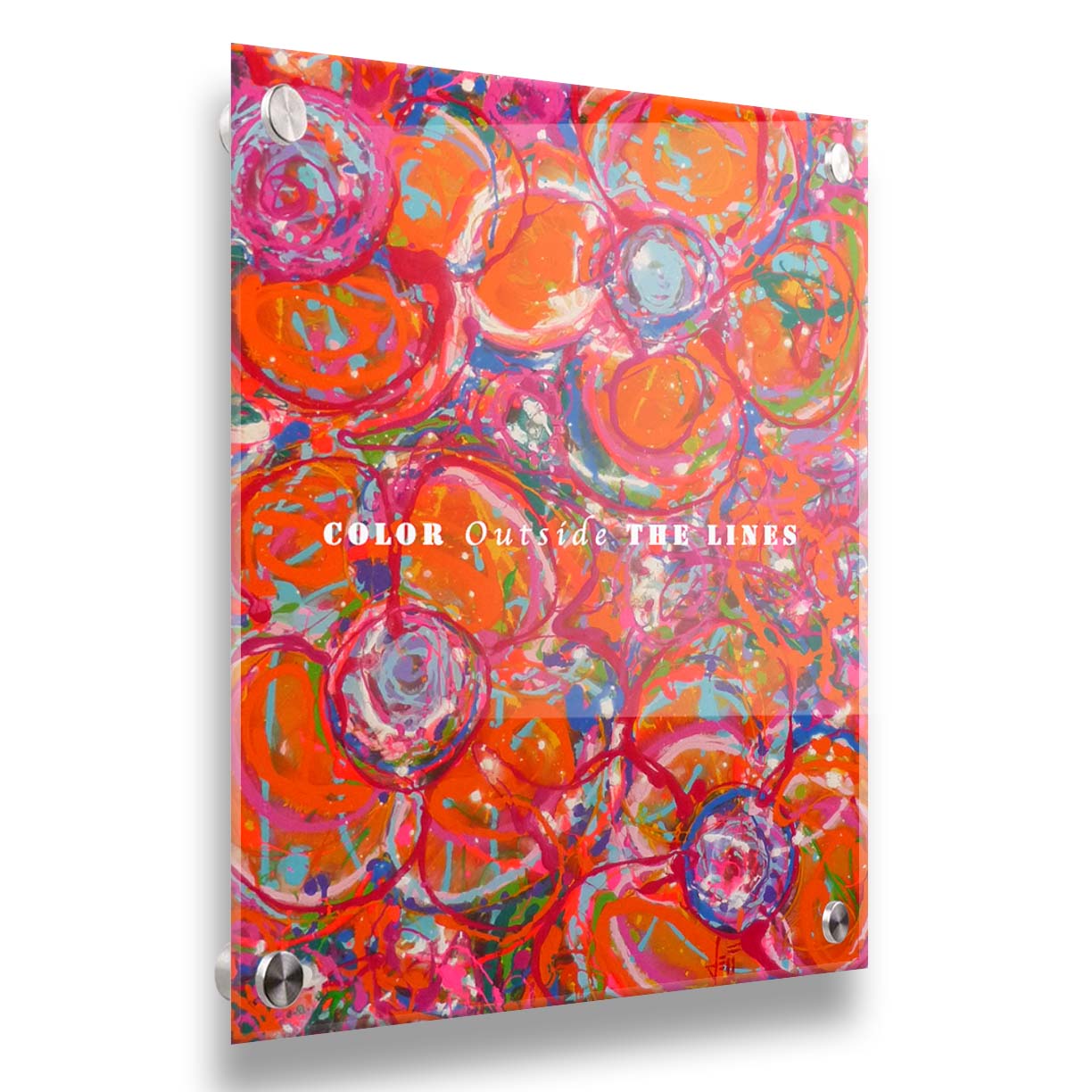 A drip painting of a cluster of abstracted flowers created with splatters of orange, red, and pink with accents of green, blue, yellow, and purple. White text in the center reads "Color outside the lines." Printed on acrylic.