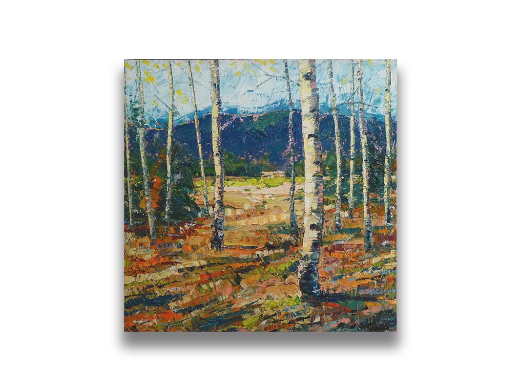 A painting of a birch forest with mountainas in the background. Printed on canvas.