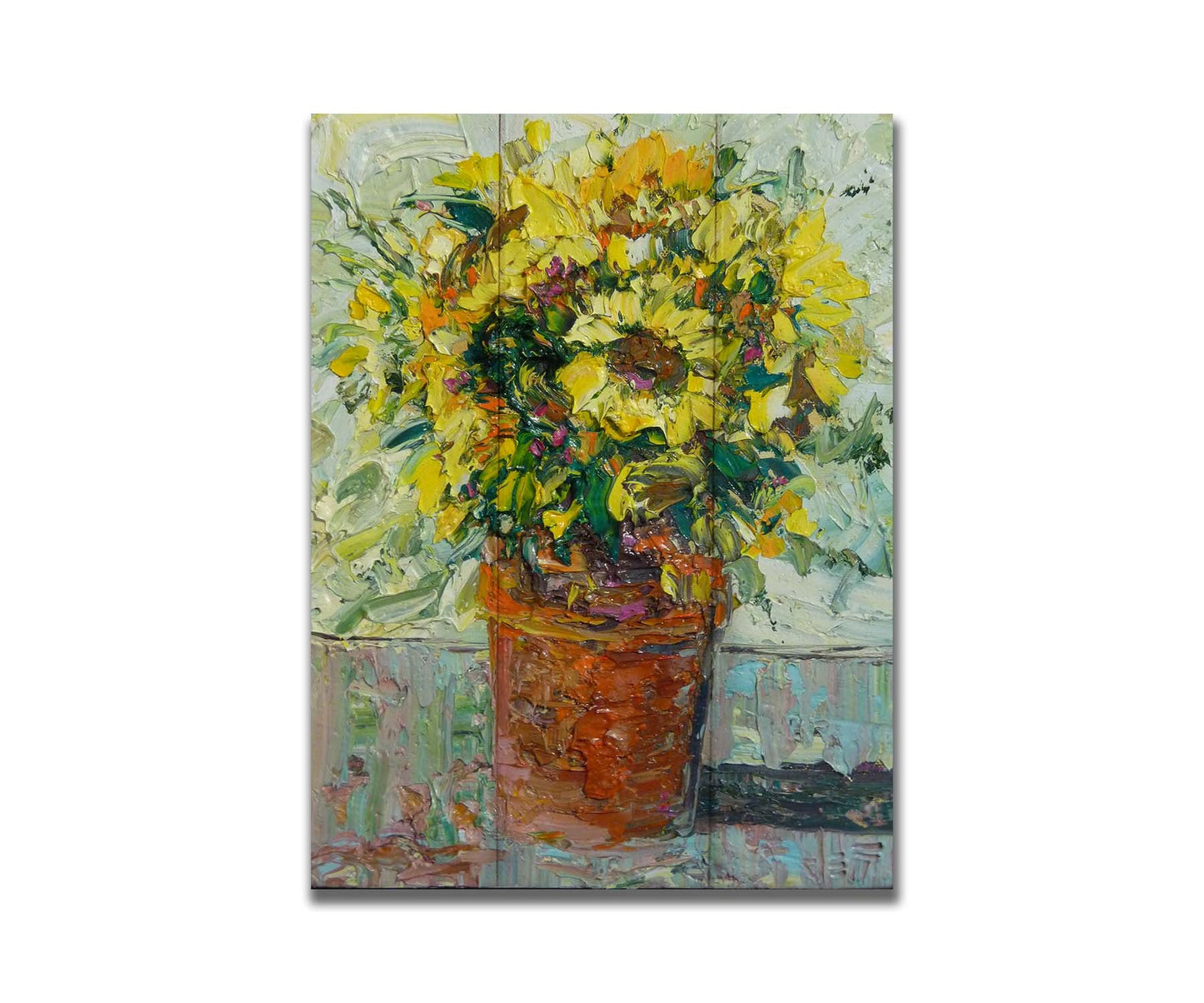 An expressive painting of an orange clay pot full of yellow sunflowers. Printed on a box board.