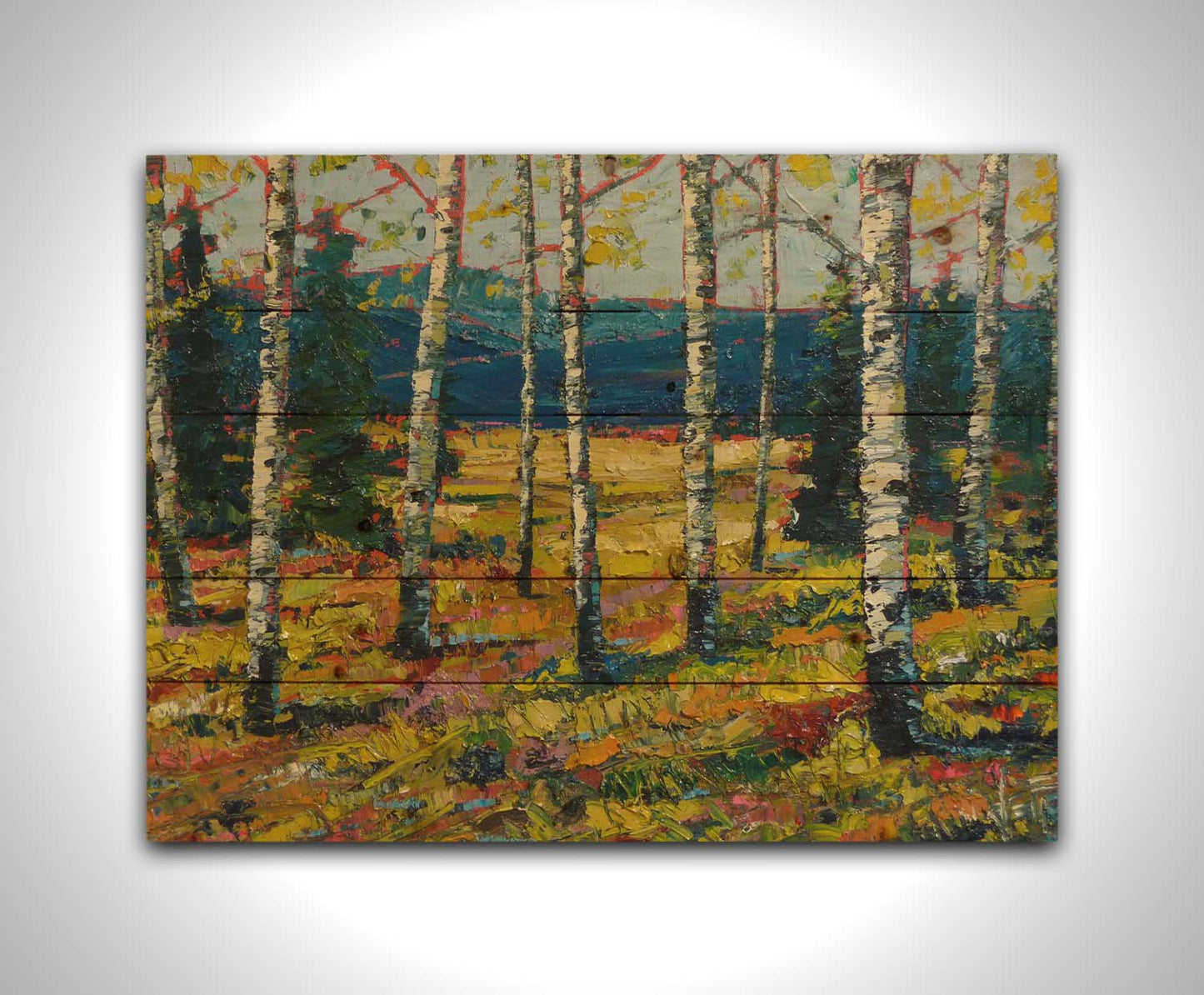 An expressive painting of a forest of birch trees, with vibrant green leaves. Printed on a wood pallet.