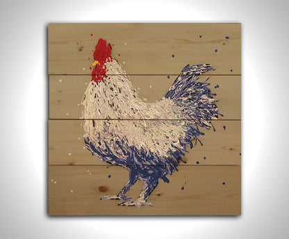 A drip painting of a white and blue chicken on a brown background. Printed on a wood pallet.