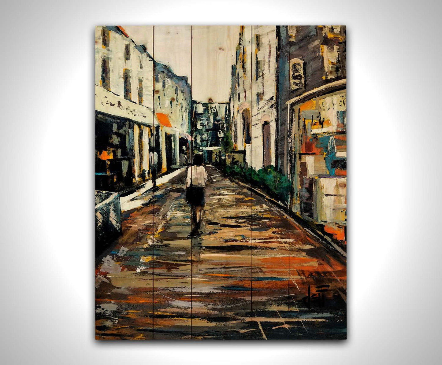 An expressive painting of a wet street lined with buildings, reflecting their colors. It is painted with highly textured, visible brushstrokes. Printed on a wood pallet.