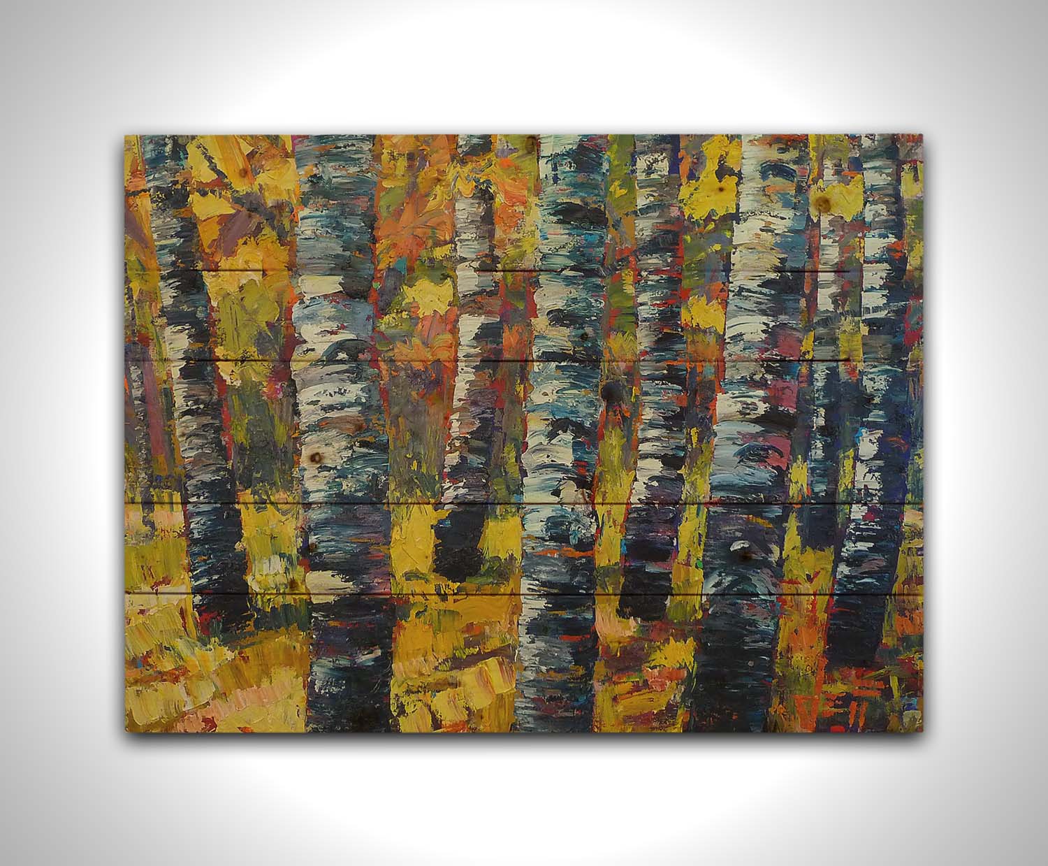 An expressive painting of a green birch forest accented with red and painted in large, blocky brushstrokes. Printed on a wood pallet.