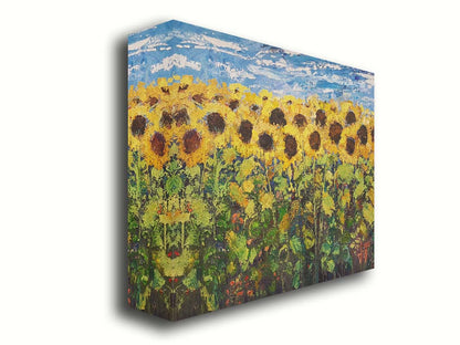 An expressive painting of a yellow field of sunflowers against a bright blue sky. It is highly textured with visible brushstrokes and thick paint. Printed on canvas.