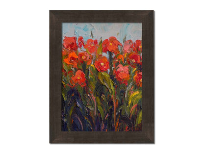 An expressive painting of a bunch of red flowers, made with thick brushes of paint. Printed on canvas and framed.