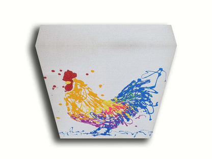 A drip painting of a brightly colored yellow and blue rooster, accented with red, pink, green, and purple. Printed on canvas.