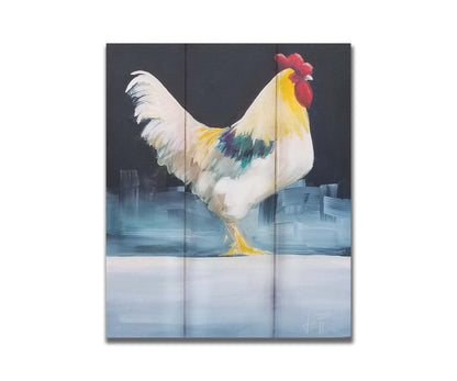 A painting of a rooster in soft lighting against a dark background. Printed on a box board.