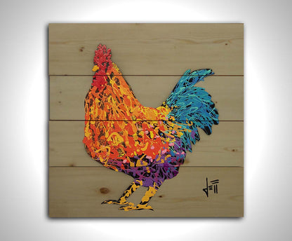 A drip painting of an orange, blue, and purple rooster on a gray background. Printed on a wood pallet.